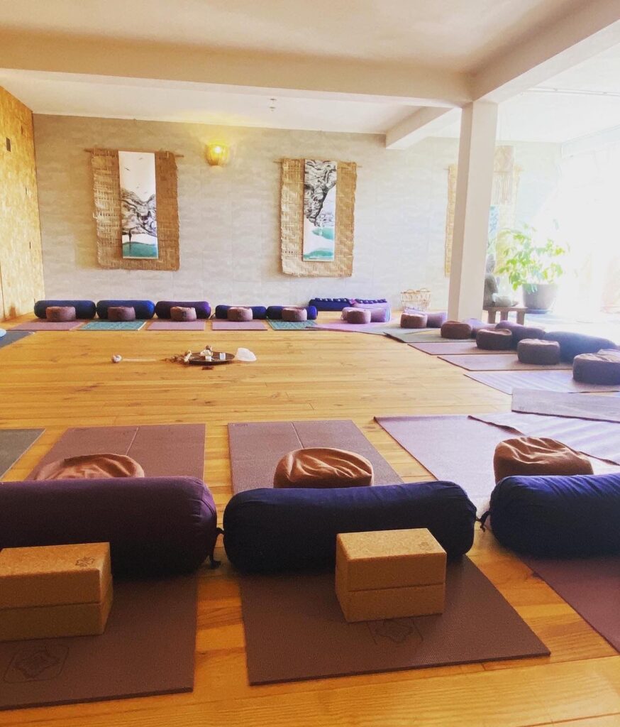 yoga mats set up for body movement at the psilocybin transformation retreat messines