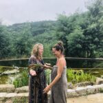 laughing ladies during a shamanic herbal bath at a psilocybin retreat with Intuitive Kasham in Portugal