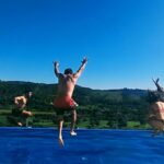 Psilocybin Mushroom Retreat group jumping pool
