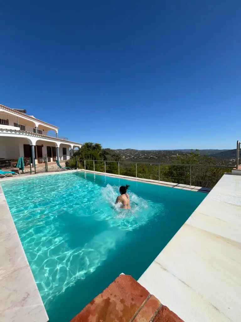 pool splash 50 year old brown woman retreat