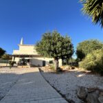 front view of a large villa algarve portugal where psilocybin retreats