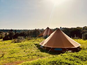 a 6m bell tent with awning, nestled in nature in the Algarve Portugal